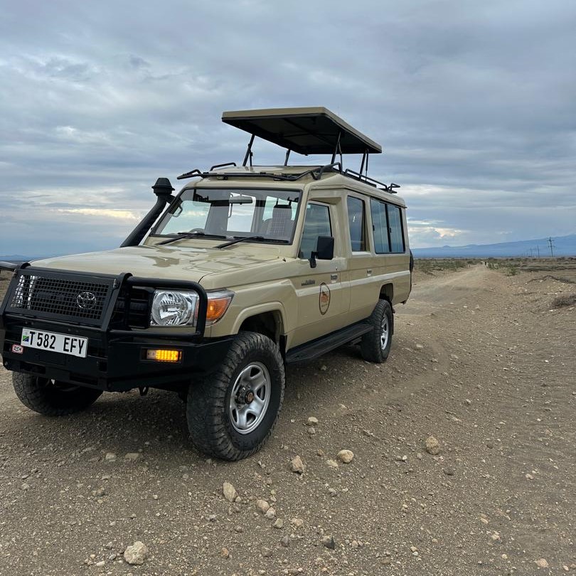 Magic of Wild Adventure Safaris Landcruizer Side and Front View with Popup Roof Open